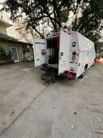 Magnet Plumbing service vehicle on-site for Grease Trap Cleaning in East Pasadena